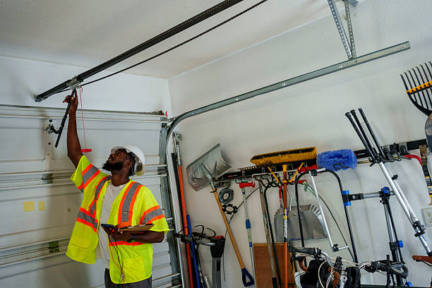 Professional Garage Door Panel Replacement technician working in Greentown, IN